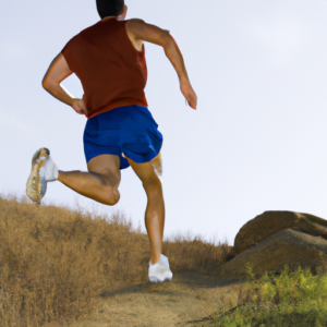 A runner sprinting up a hill, arms and legs pumping.